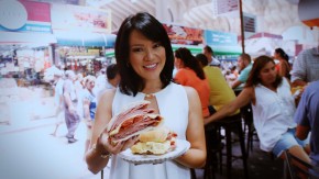 Geovanna Tominaga com sanduiche de mortadela